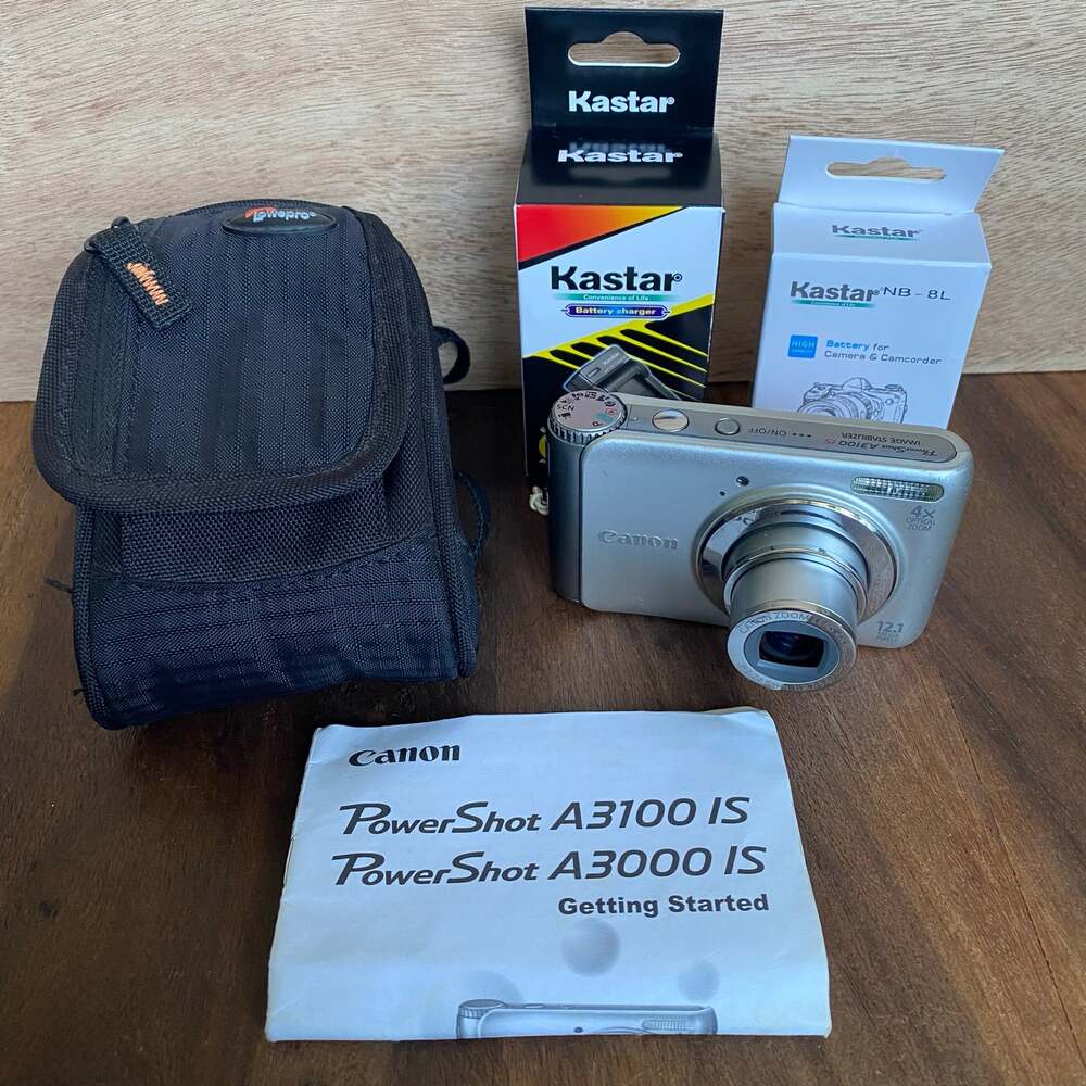 Canon PowerShot A3100 IS Silver Digital Camera W/ Battery, Charger, Case